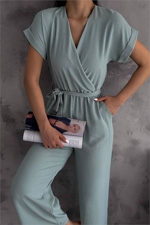 Neşeli butik kadın bej bağlama detaylı ayrobin tulum NBTG7035