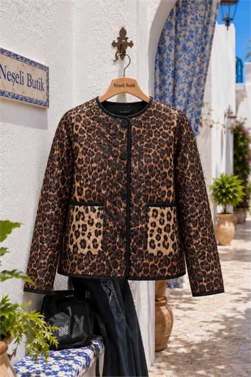 kadın kahverengi leopar desen cepli kapitone oversize ceket NBHT04